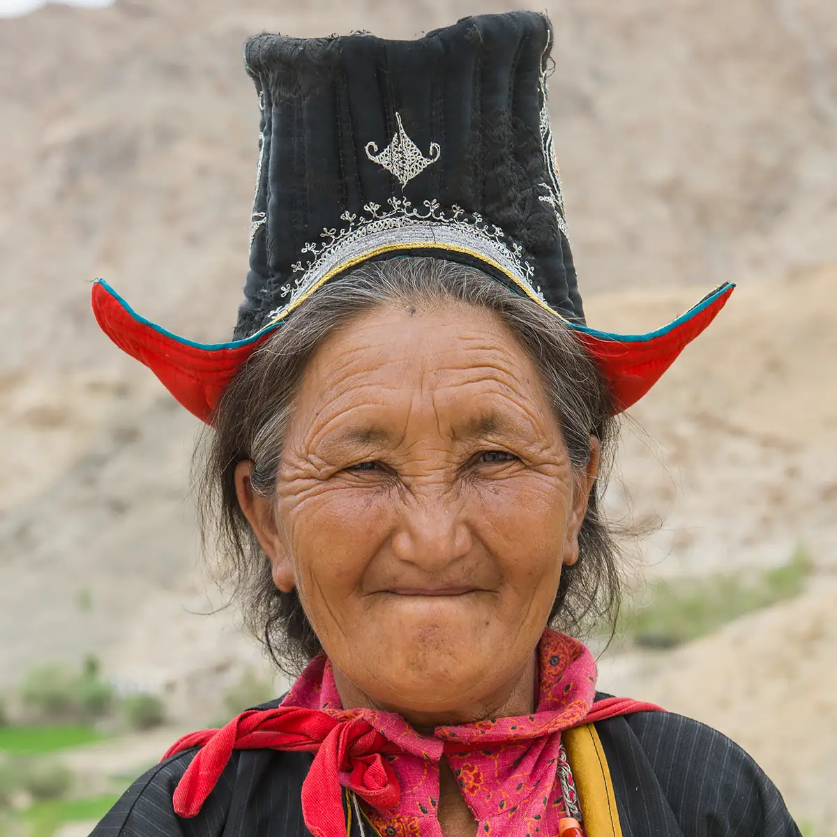 Woman traditional tipi hat Ladakh photo tour