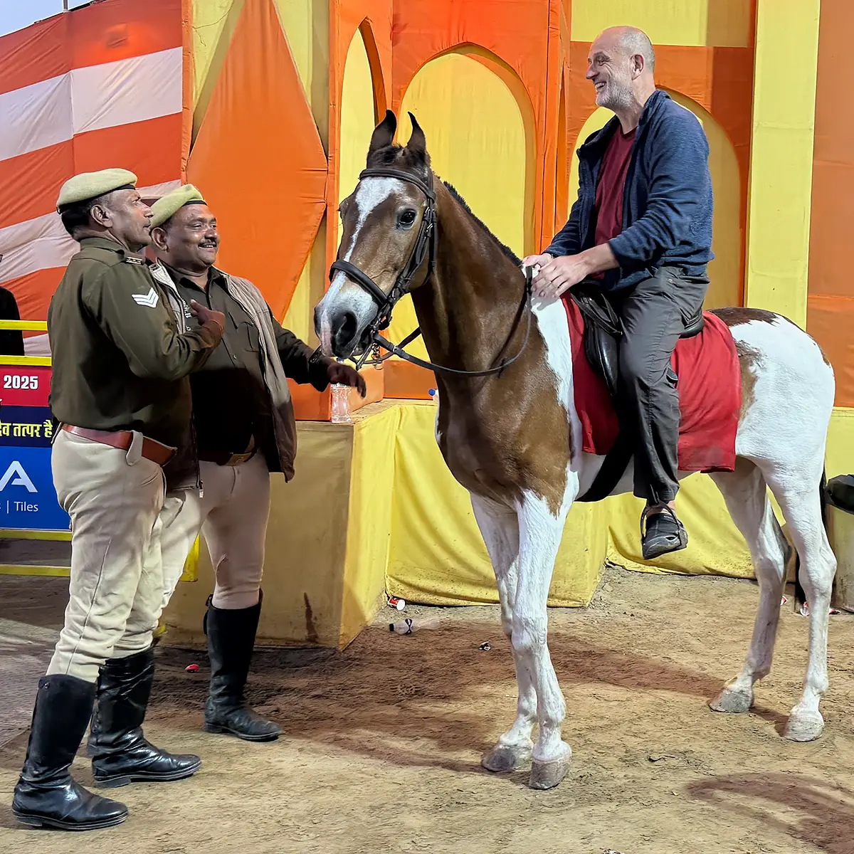 Steve Davey photographer riding police horse kumbh mela